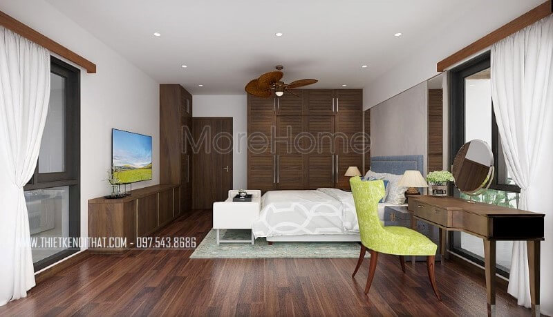 Sàn gỗ, bộ bàn ghế trang điểm, tủ quần áo, kệ tivi, cửa gỗ gỗ óc chó đã tạo nên vẻ đẹp sang trọng, độc đáo trong phong cách hiện đại tại phòng ngủ master mặc dù với phong cách này đồ nội thất gỗ công nghiệp thường là lựa chọn phổ biến. Thiết kế phòng ngủ biệt thự