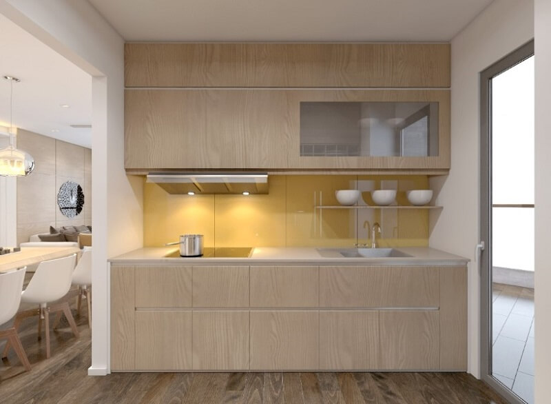 Mẫu tủ bếp gỗ công nghiệp cao cấp màu sáng với phần trần treo nhỏ gọn kết hợp thiết bị bếp thông minh. Thiết kế và sản xuất tủ bếp đẹp